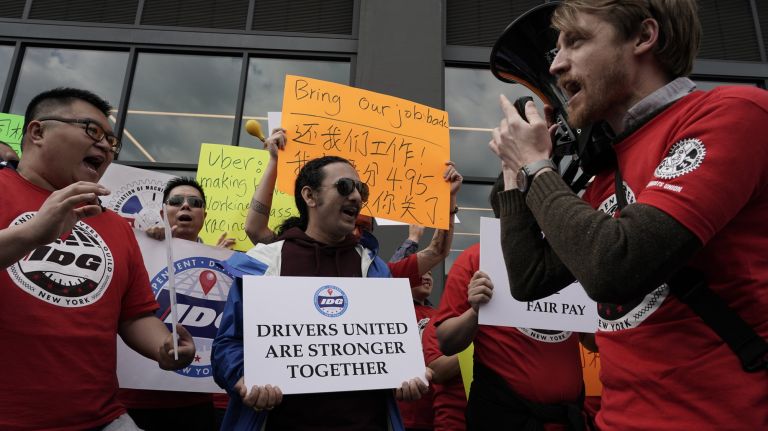 Drivers rally in front of TLC offices in Long Island City, Queens, on Wednesday.