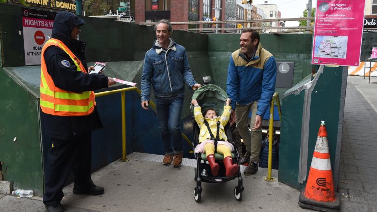 MTA employees distribute alternative service brochures Sunday, in hopes of diverting riders to other stations before swiping their MetroCards.