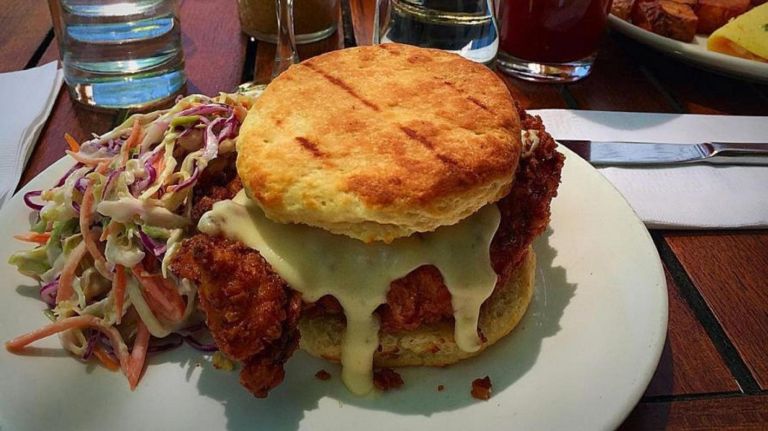 Anella serves up the neighborhood's best fried chicken sandwich -- topped with jalapeño honey butter, white gravy and coleslaw.