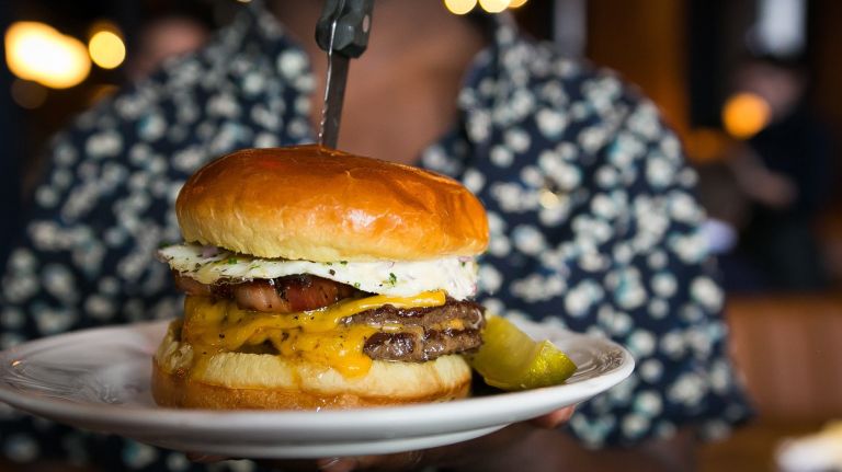 Chicago destination Au Cheval is now serving its egg-topped burger in NYC.
