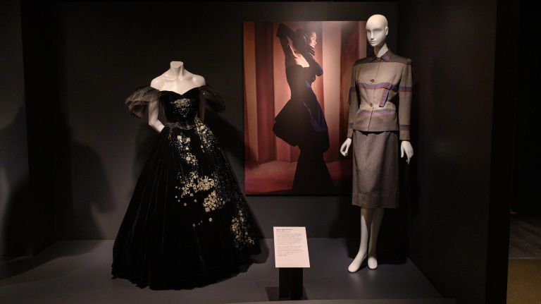 The dress by Adrian on the left was worn by Greta Garbo in "Camille" in 1936. It was part of the Adrian retrospective show in 1971.