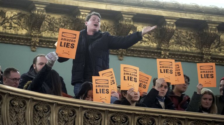 Protesters disrupt the second of four City Council hearings over Amazon's planned HQ2 in Long Island City on Wednesday.