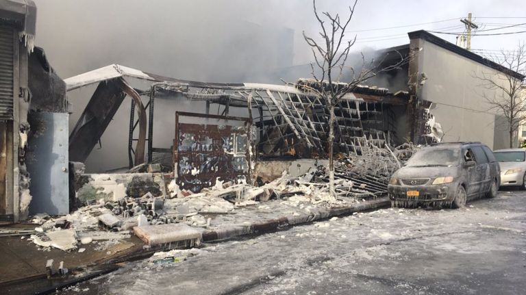 A fire in College Point, Queens, on Monday was complicated by the dangerously cold temperatures, the FDNY said.