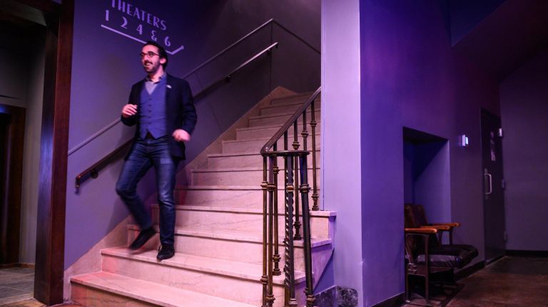 Two layers of carpet were removed to reveal an original marble staircase at Nitehawk Prospect Park.