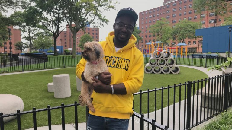 A revamped Ocean Bay campus transitions away from the traditional NYCHA setup 1 Kaheem Bates says he appreciates the changes at Ocean Bay Apartments.