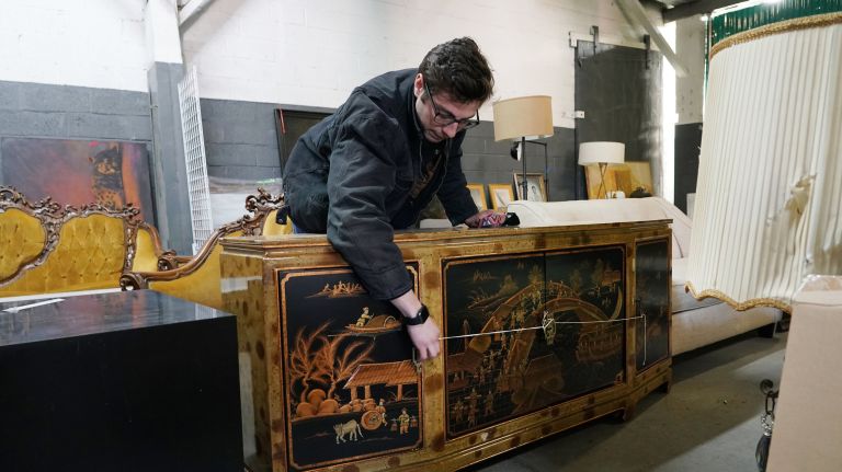 Pete Dinolfo works at Junkluggers in Astoria/LIC on Tuesday March 26, 2019. The company empties out houses and apartments and businesses and tries to donate and recycle everything - they are making it a goal by 2020 to not send anything to a landfill&nbsp;33-56 11th Street,