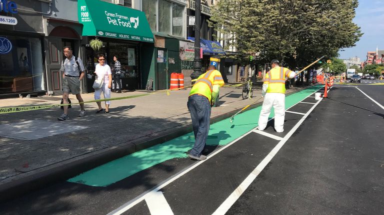 Swift response to deadly Park Slope crash a guide for safer streets, advocates say 1 Department of Transportation crews create a protected bike lane on Ninth Street in Park Slope.