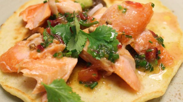 Marcus Samuelsson's menu included arctic char on a hoe cake with avocado and black bean at the first Green & Fanny dinner series on Wednesday night. &nbsp;