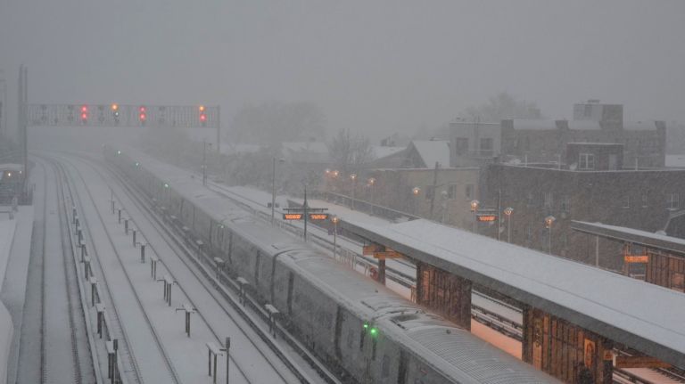 Snow falls on the Long Island Rail Road's Woodside Station, Queens, on Nov. 15, 2018.