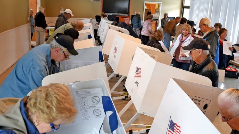 Voters mark their ballots in last week's election in Riverhead.