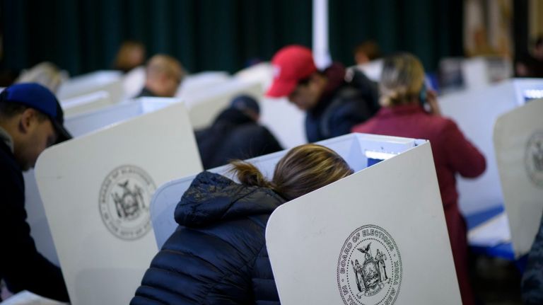 Show Albany why your vote matters 1 Voters cast ballots at St. Sebastian's School in Woodside, Queens, on Nov. 8, 2016.
