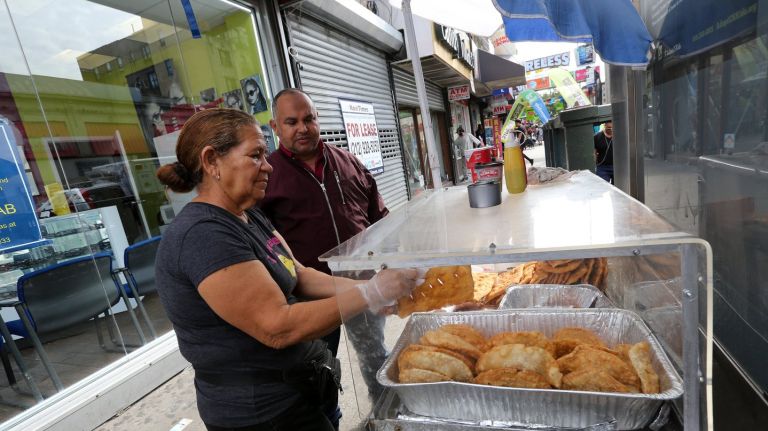 A street vendor at the corner of 181st and St Nicholas Avenue in Washington Heights.