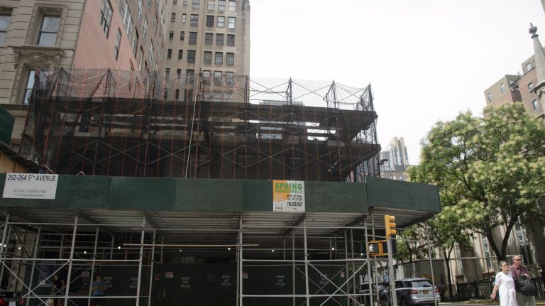 The city will consider proposals for art displays on construction fences and sidewalk sheds. 