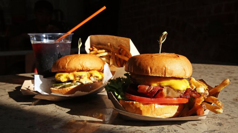 As Shake Shack heads to Harlem, local burger spots brace themselves 1 Harlem Burger Co. Company burger comes with an array of options, including jalapeno and bacon.