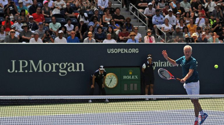 Louis Armstrong Stadium in Queens dedicated with help from John McEnroe, Wynton Marsalis 1 John McEnroe returns a volley at the new Louis Armstrong Stadium in Flushing Meadows-Corona Park on Wednesday, August 22, 2018.