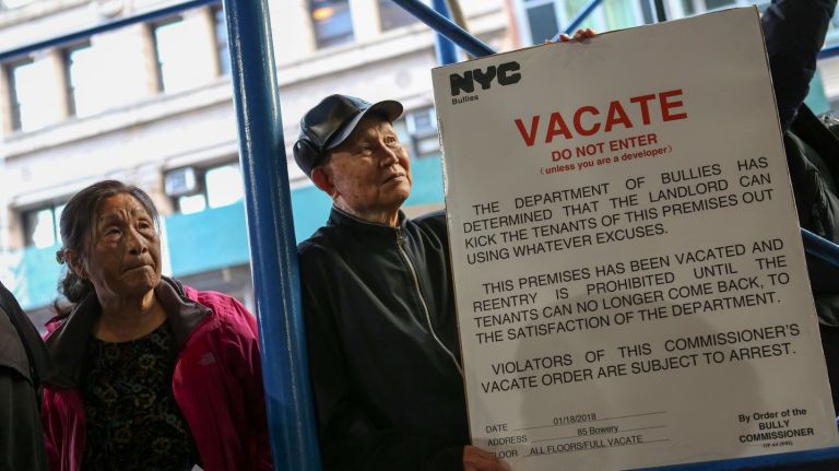 Tenants of 85 Bowery and housing advocates demonstrate in front of the Department of Buildings office at 280 Broadway on April 26.