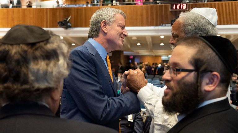 Mayor Bill de Blasio greets religious leaders before the start of the NYPD's annual high holy days security briefing Wednesday at One Police Plaza.