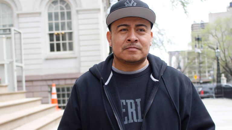 Clemente Martinez, a delivery worker,  asked for more time and support from city agencies so he could bring his e-bike up to city standards and escape from NYPD fines at a rally outside City Hall on Monday, April 30, 2018. 