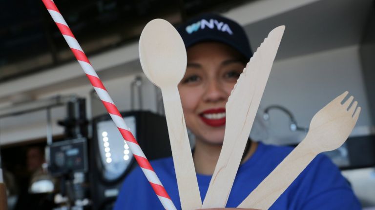 A growing number of New York City restaurants and bars are ditching plastic straws and utensils for environmentally-friendly paper or reusable ones.