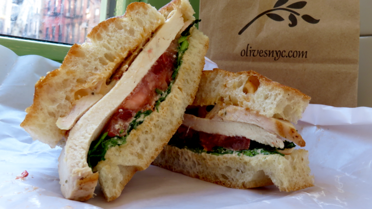 Bowie's favorite order at this charming take-out sandwich shop was the grilled chicken breast sandwich ($11). It comes on a square of fluffy focaccia bread, with an ample coating of chipotle mayo and layers of crispy-stalked watercress and tomatoes. The store sitting at the corner of Prince and Sullivan streets also offers salads, Counter Culture coffee, soups and two glass cabinets full of cookies, brownies and cakes. (Wednesday's cookie special was a $4 chocolate heath bar pecan treat.) You may encounter a line at lunchtime, but service here is brisk and friendly. (191 Prince St., SoHo,<a href=