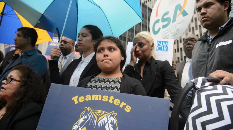 Family members of Eber Garcia-Vasquez, including his wife Maria Chavez, left, daughter Arly Garcia, second from left, granddaughter Kaizy Acosta, center, daughter Joanna Acosta, second from right, and son Melvin Garcia, right, rallied outside ICE headquarters in Manhattan on August 29, 2017.