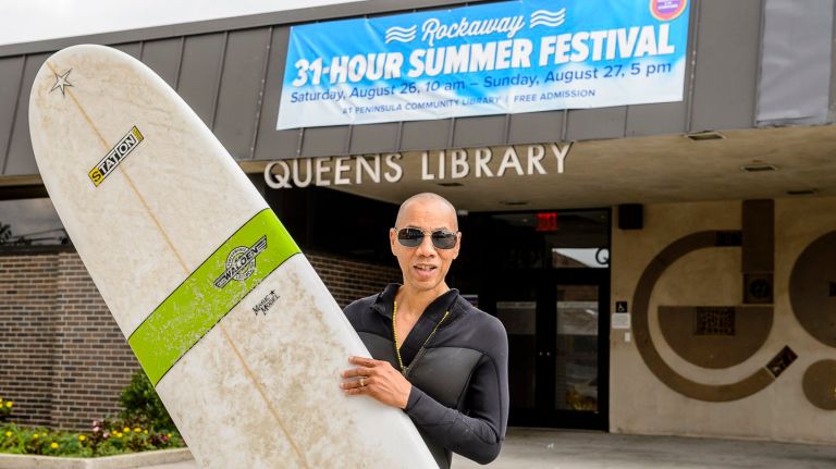 Dennis  M.  Walcott, CEO of the Queens Public Library, is getting in the spirit of the library's upcoming all-nighter  on August 26-27.