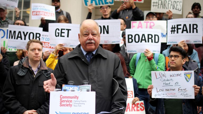 David Jones, the executive director of the Community Service Society of New York, calls for the mayor's support of the Fair Fares initiative at a City Hall rally on April 25, 2017.