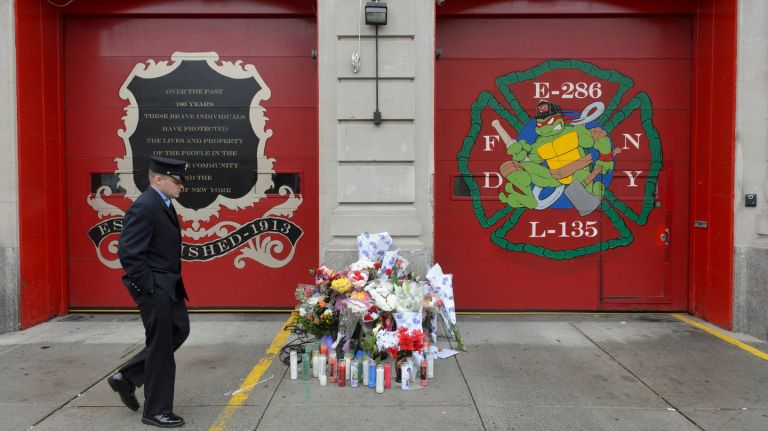 FDNY Engine 286 and Ladder 135 in Ridgewood, Queens is the site of a makeshift memorial in honor of fallen firefighter William Tolley, who died in the line of duty on April 20, 2017.
