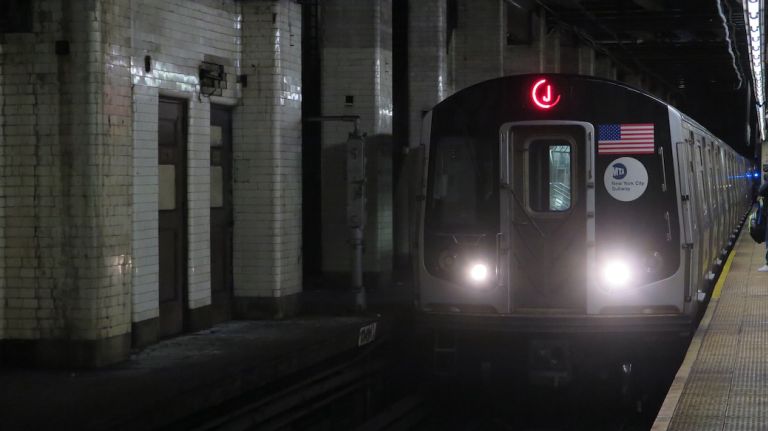 A man tried to take a baby from her carrier on a J train in Brownsville on April 9, 2017, police said.