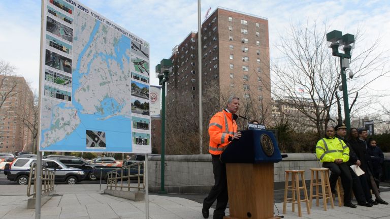 Mayor Bill de Blasio discusses how President Donald Trump's budget could impact Vision Zero projects during a news conference near Tillary Street in Brooklyn on Tuesday, March 21, 2017. 