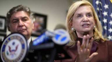 The federal government should protect Jewish cemeteries from anti-Semitic vandalism, Rep. Carolyn Maloney said on March 6, 2017. Above, Maloney, right, New York Board of Rabbis Executive Vice President Joseph Potasnik, left, and others, hold a news conference to condemn the recent wave of anti-Semitic sentiment and actions.