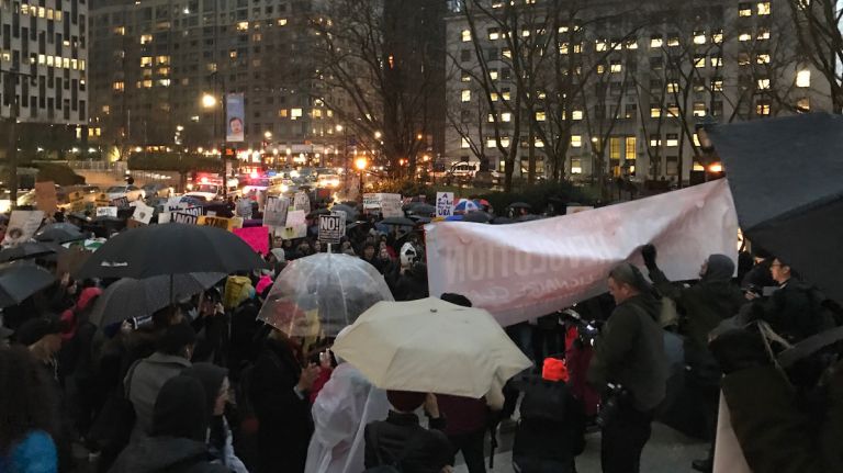 Trump protest at NYC's Foley Square draws New Yorkers chanting, 'Stand up, fight back' 1 New Yorkers protested President Donald Trump on Inauguration Day in Foley Square, despite the rain and chilly temperatures.