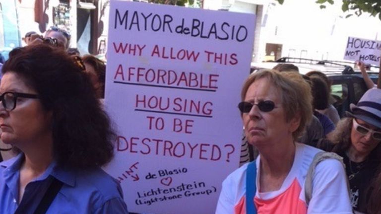 Demonstrators rally against  the destruction of  apartment buildings in the East Village  to make room for a hotel on Monday, Aug. 22, 2016.