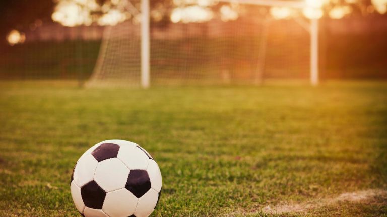 Football in the sunset