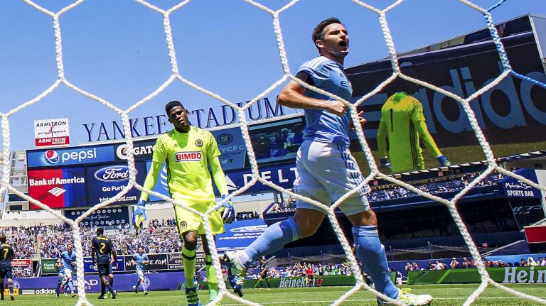 New York City FC midfielder Frank Lampard reacts to a goal scored by his teammate forward David Villa (not shown) as Philadelphia Union goalkeeper Andre Blake eacts in an MLS game between the Philadelphia Union and New York City FC at Yankee Stadium in Bronx, New York on Saturday, June 18, 2016.