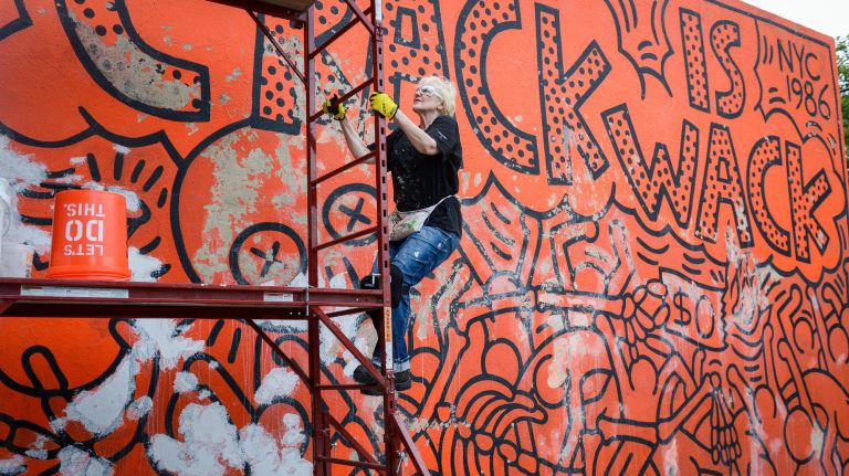 'Crack is Wack' mural by Keith Haring finally getting face-lift 1 Artist Louise Hunnicutt works to restore Keith Haring's 1986 "Crack is Wack" mural along the Harlem River Drive.