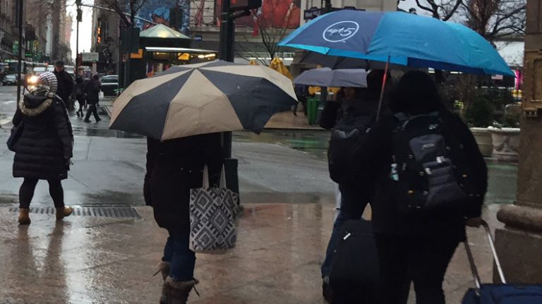 New Yorkers should keep their umbrellas close by; a mix of rain and snow is expected April 9, 2016.