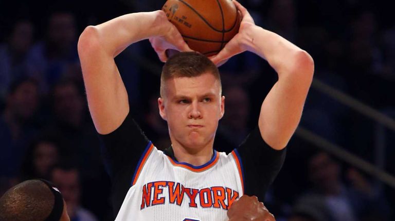 Kristaps Porzingis of the New York Knicks controls the ball against Paul Pierce of the Los Angeles Clippers at Madison Square Garden on Friday, Jan. 22, 2016.