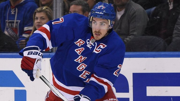 New York Rangers defenseman Ryan McDonagh skates with the puck against the Carolina Hurricanes in the second period of a game at Madison Square Garden on Monday, Nov. 30, 2015.