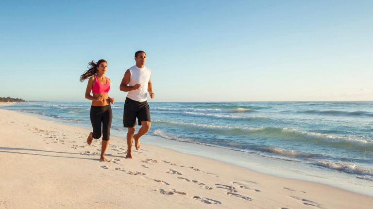 One pro tip while your travelling: Run along the beach during your vacation.