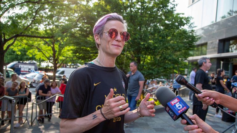 Megan Rapinoe and her fellow soccer champs arrive at the Wagner Hotel in lower Manhattan on Monday.