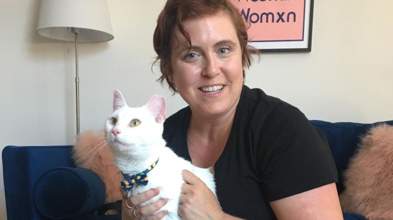 Eleanor Whitney and her new cat Biscuit hang at their new apartment in Sunset Park.