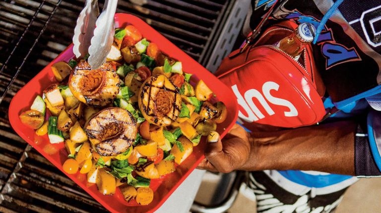 Chef Lazarus Lynch, with cookbook 'Son of a Southern Chef,' proud Food & Finance H.S. grad 2 Grilled peach, cucumber and tomato salad from "Son of a Southern Chef."