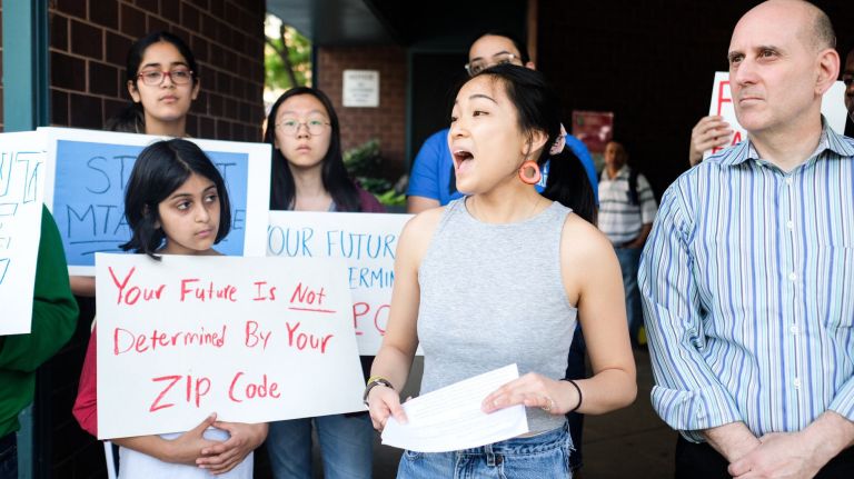 Emma Rehac, 17, a student activist at Eleanor Roosevelt High School, rallies with Assemblyman Harvey Epstein and others Sunday outside Union Square station&nbsp;in support of&nbsp;an expansion of full-fare student MetroCards.