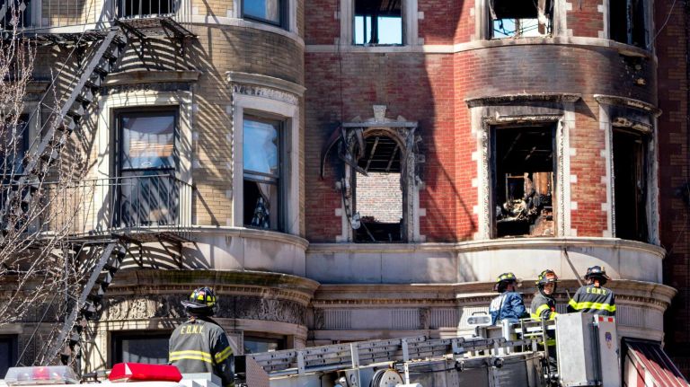 Movie set clutter, toxic fumes contributed to firefighter Michael Davidson's death: Report 3 FDNY crews work on the scene at 773 St. Nicholas Ave. on March 23, 2018.