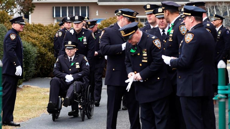 NYPD Sgt. Matthew Gorman attends the funeral for NYPD Det. Brian Simonsen at the Church of St. Rosalie in Hampton Bays on Wednesday.