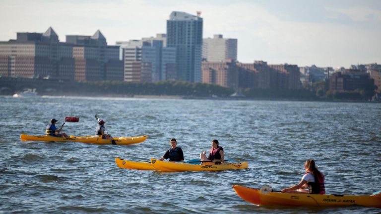 16 cheap outdoor thrills, ice skating to zoos 7 People kayak on the Hudson River.