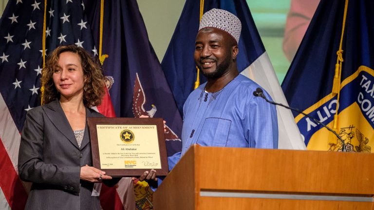 New York City's safest cabdrivers join TLC's honor roll 1 Cabdriver Ali Abubakar, 43, receives a Safe Driver award from Meera Joshi, the city's taxi and limousine commissioner, at a ceremony in Manhattan on Wednesday.