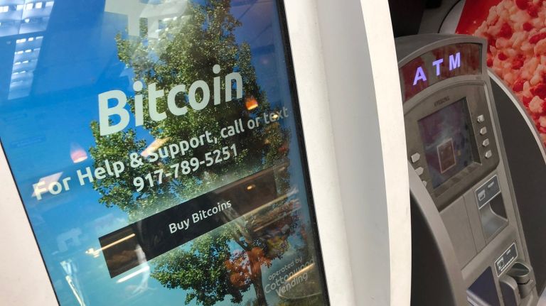 Bitcoin ATMs, like this one on 34th Street and Ninth Avenue, are just one way blockchain technology is working its way into the city's economy.