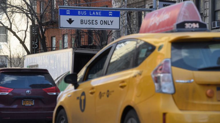 Let cameras unclog NYC's bus lanes 1 Vehicles pass an entrance to a designated bus lane on Third Avenue near East 36th Street in Manhattan on Feb. 16, 2017.